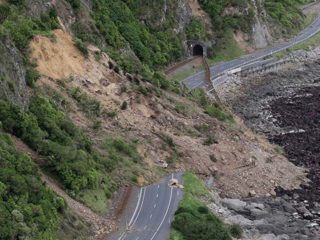 kaikoura-near-the-quakes-epicentre-has-been-cut-off-by-landslides-this-image-shows-the-damage-to-state-highway-one-and-the-main-railway-line-north-of-the-town